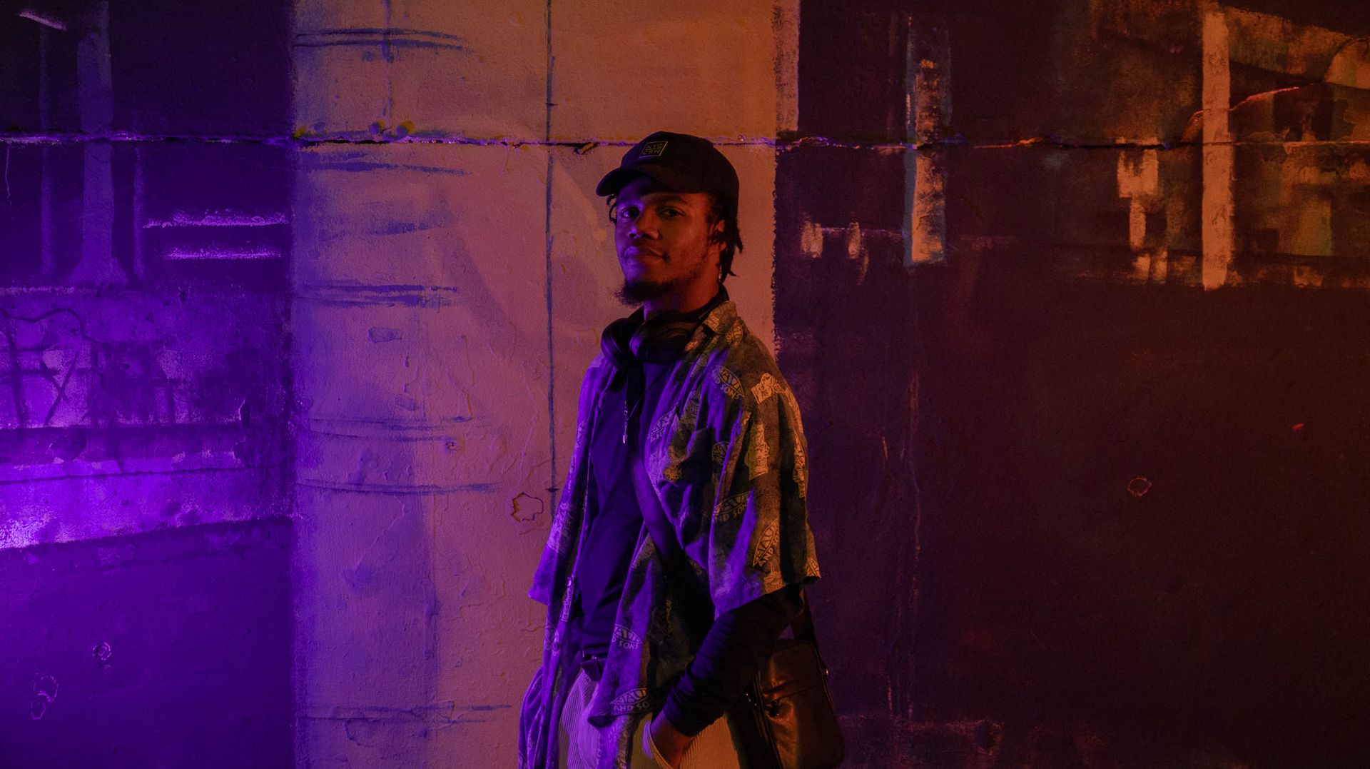 a man looking at the camera posing as a chill guy meme behind the skate ramp